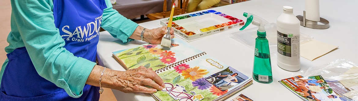 elderly woman painting