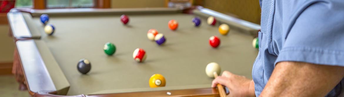 man playing pool