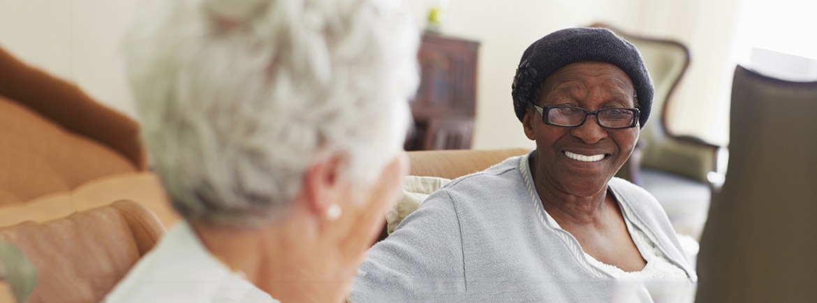 elderly women sitting and chatting